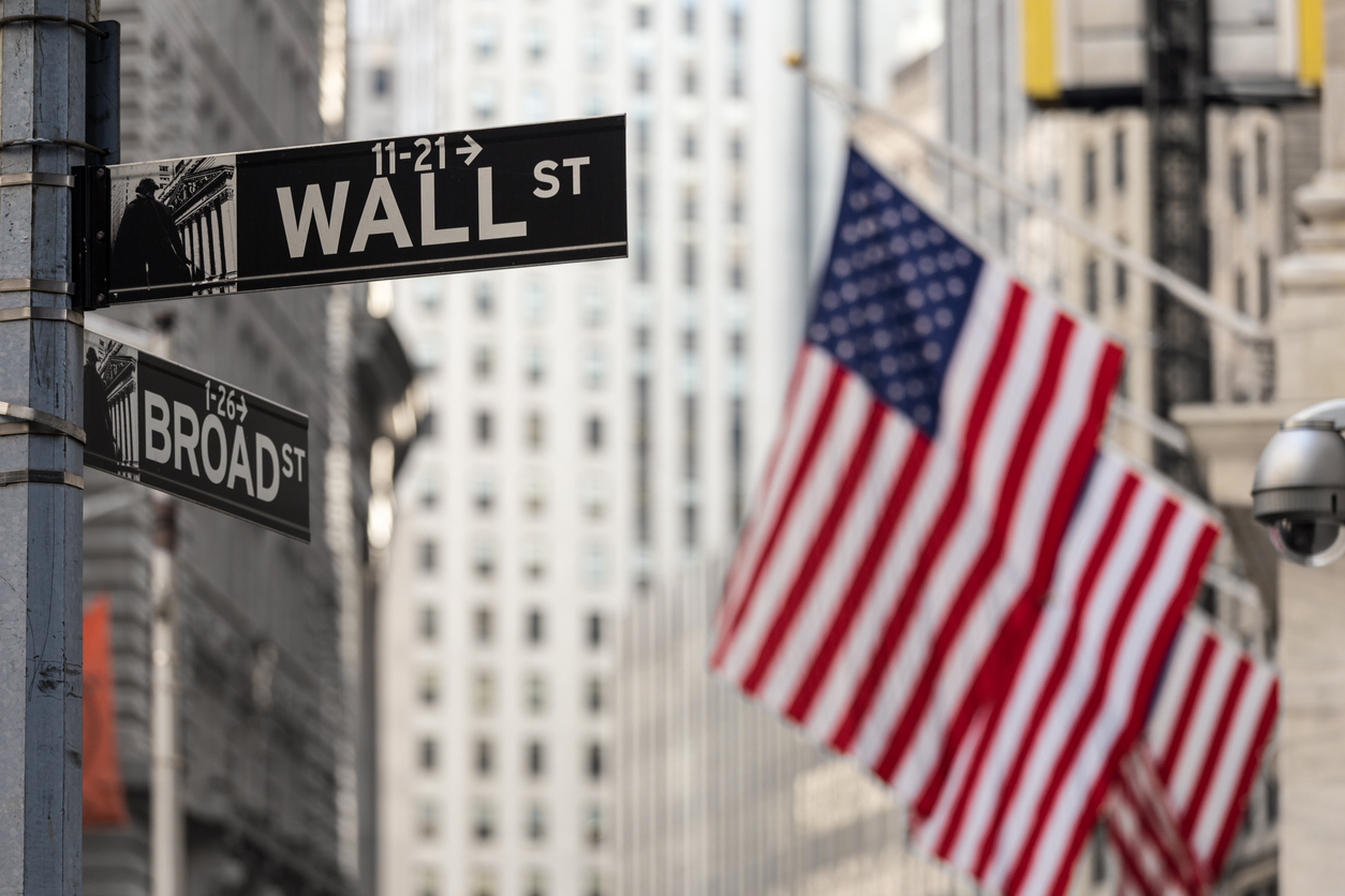 wall street sign with usa flag