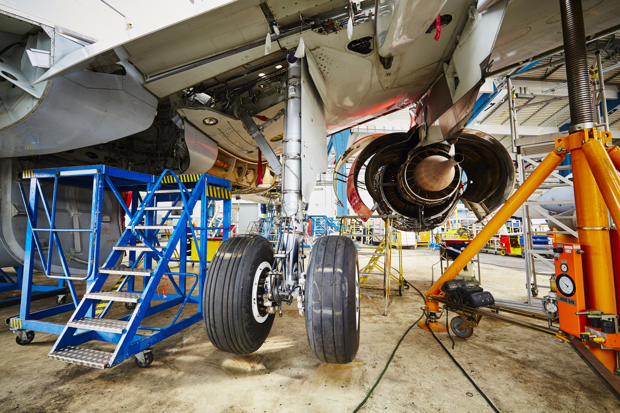 chassis of plane under heavy maintenance